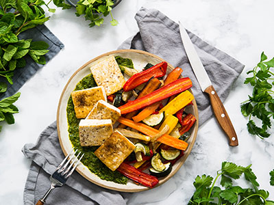 tofu chermoula with vegetables on a plate